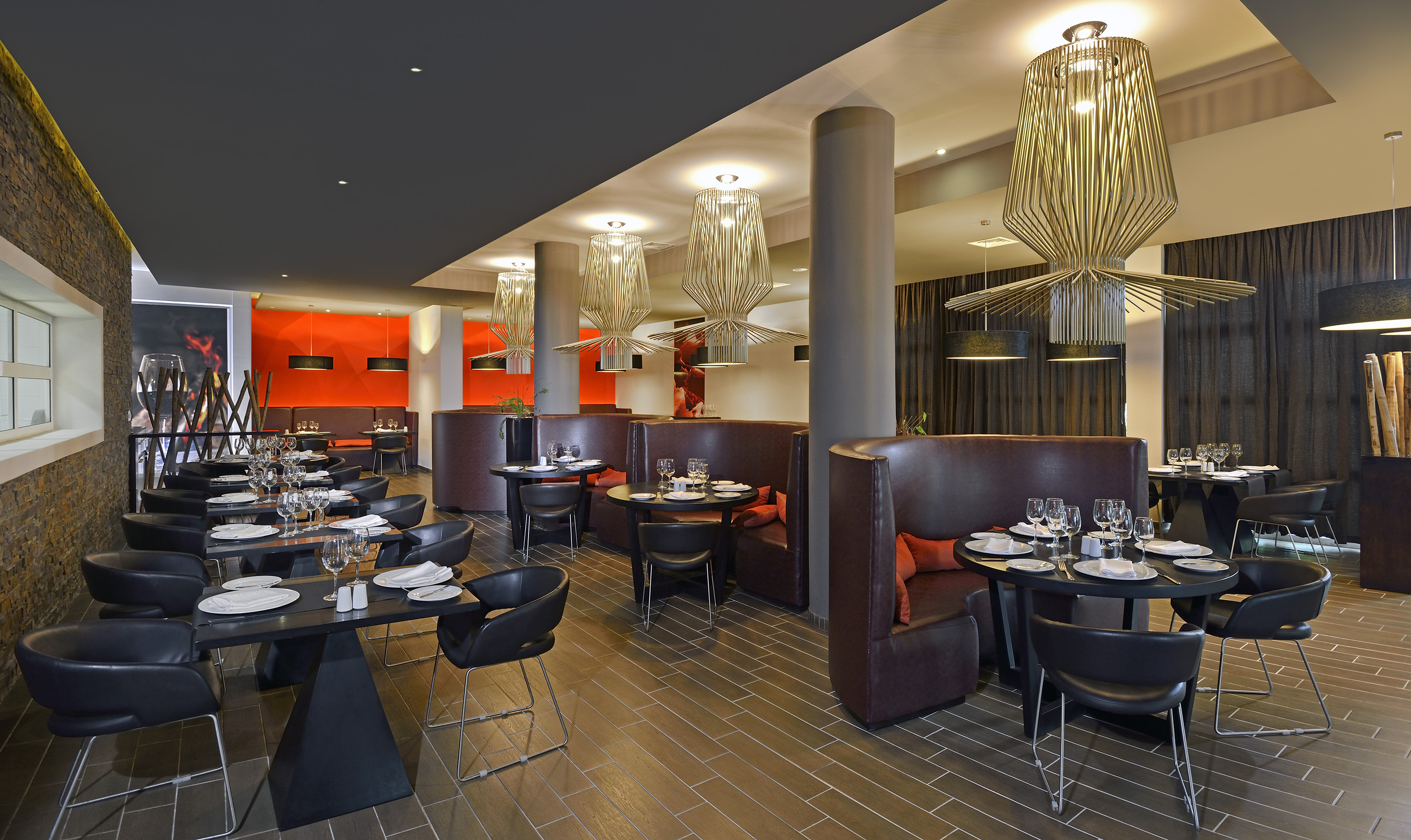 a restaurant with tables and chairs