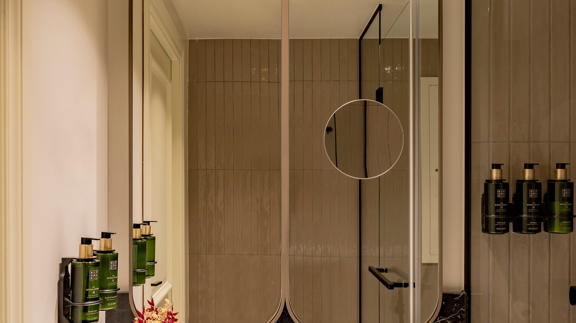 a bathroom with a mirror and sink