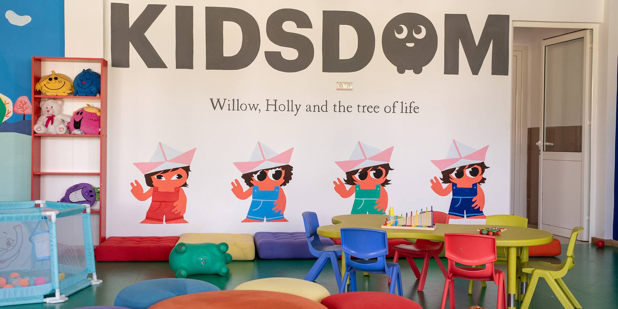 a room with a group of kids in it