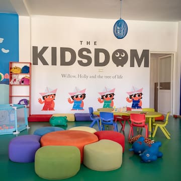 a room with a group of kids in it