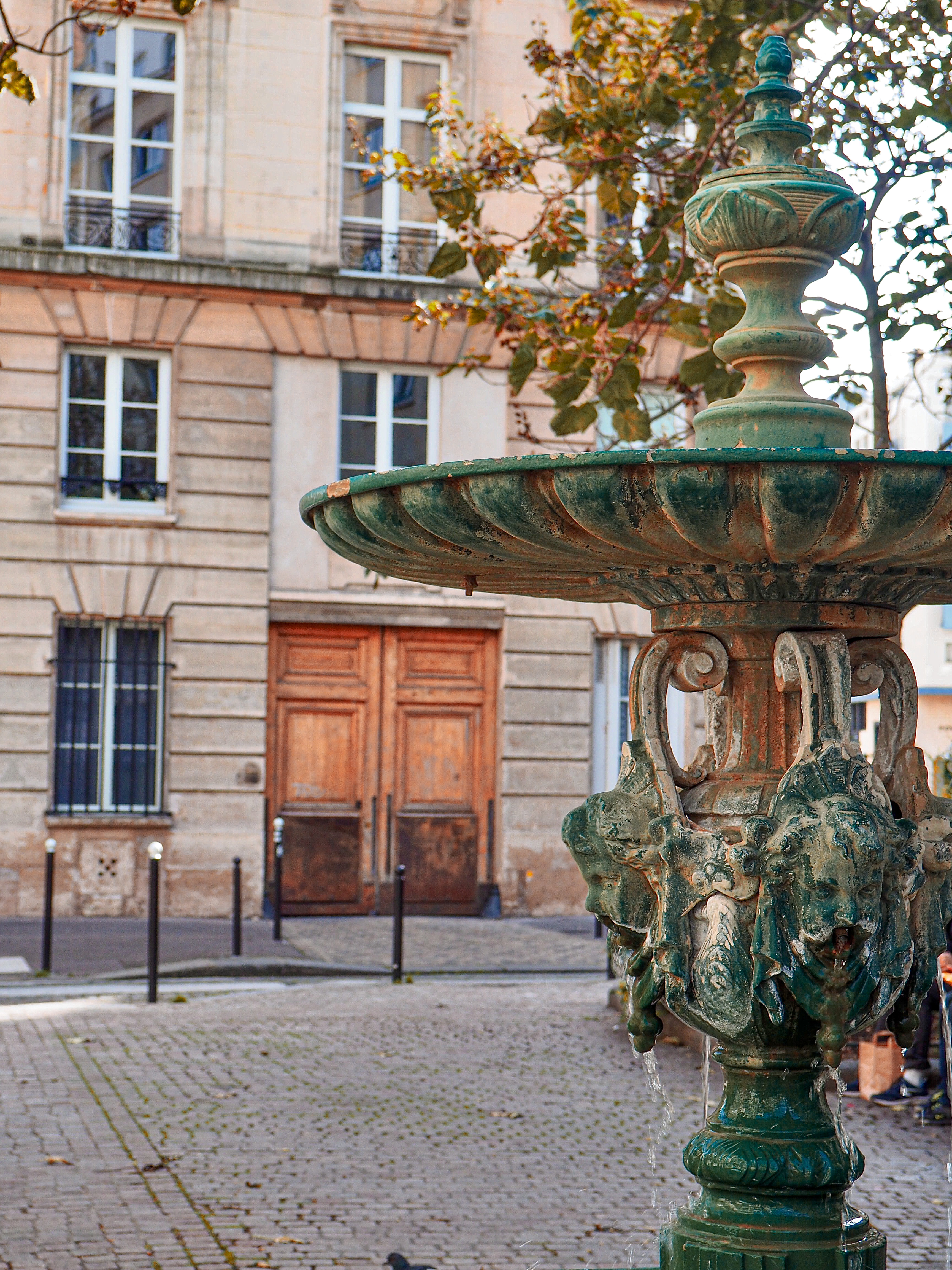 a fountain in front of a building