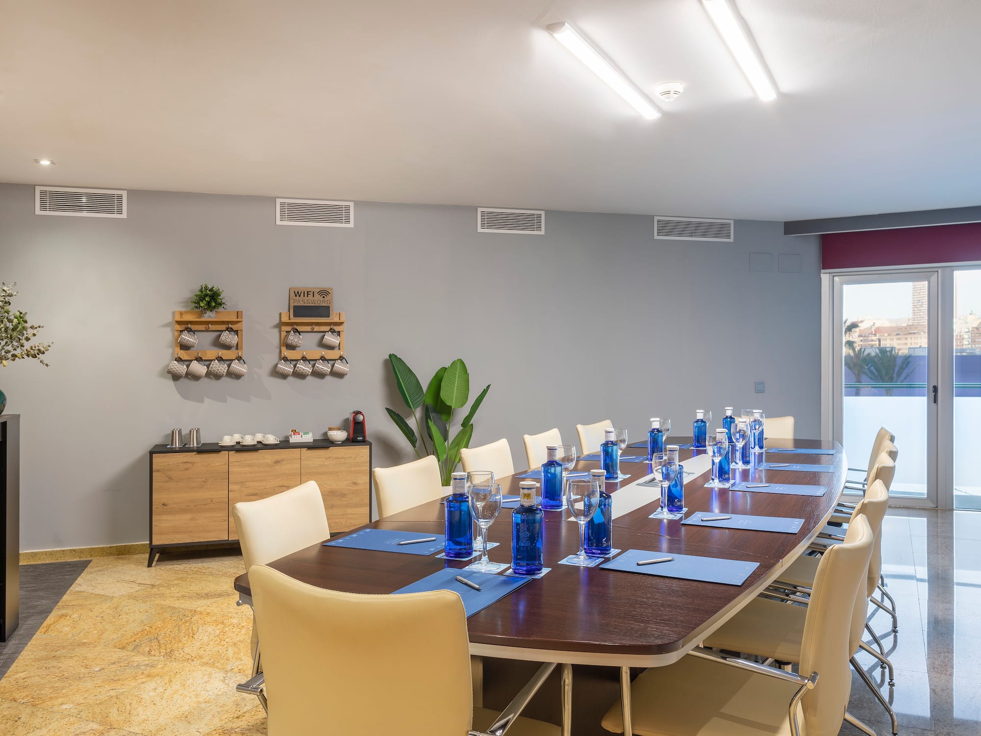 a conference room with a table and chairs