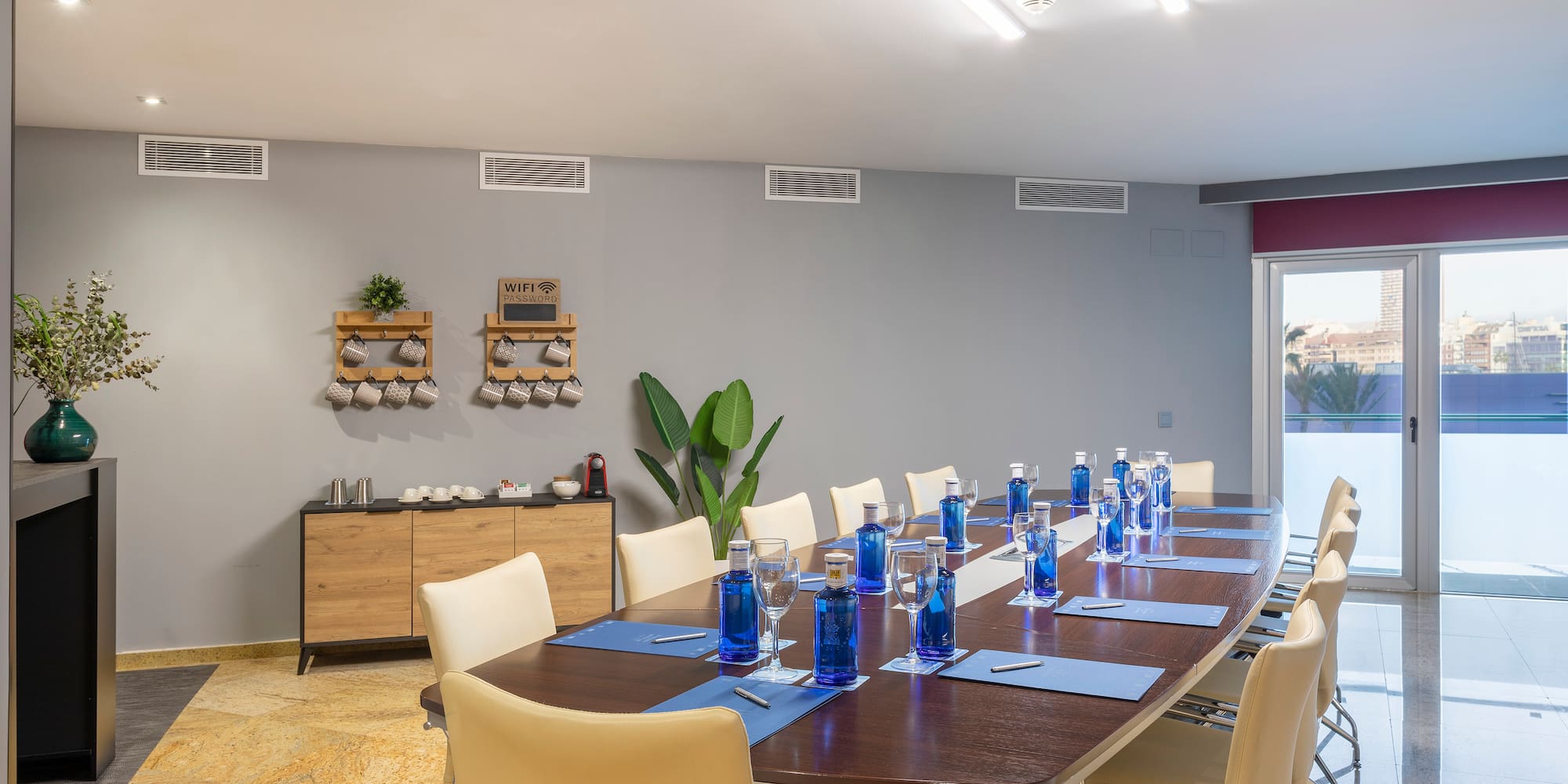 a conference room with a table and chairs