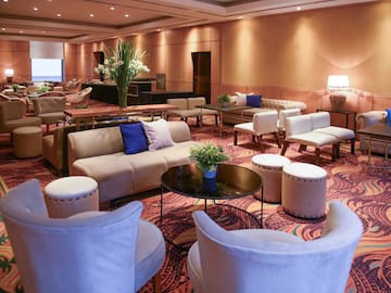 a room with chairs and tables