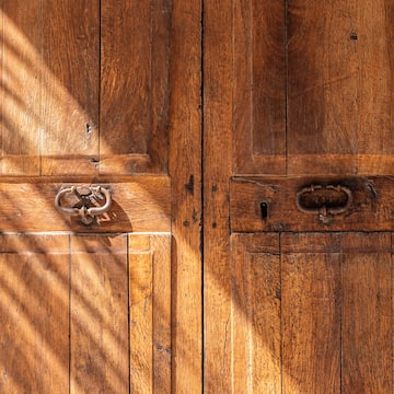 a wooden door with a lock