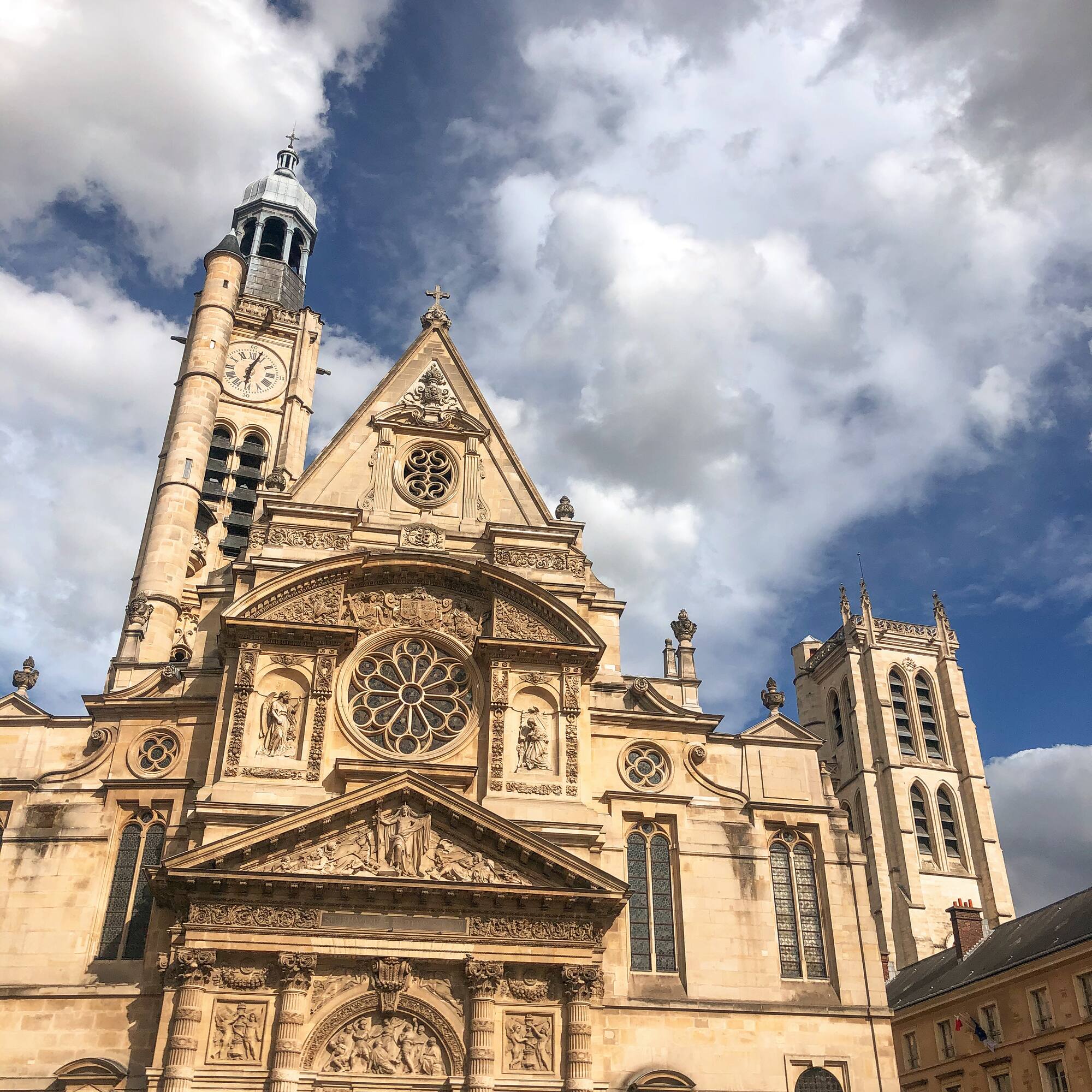 a large stone building with a clock tower