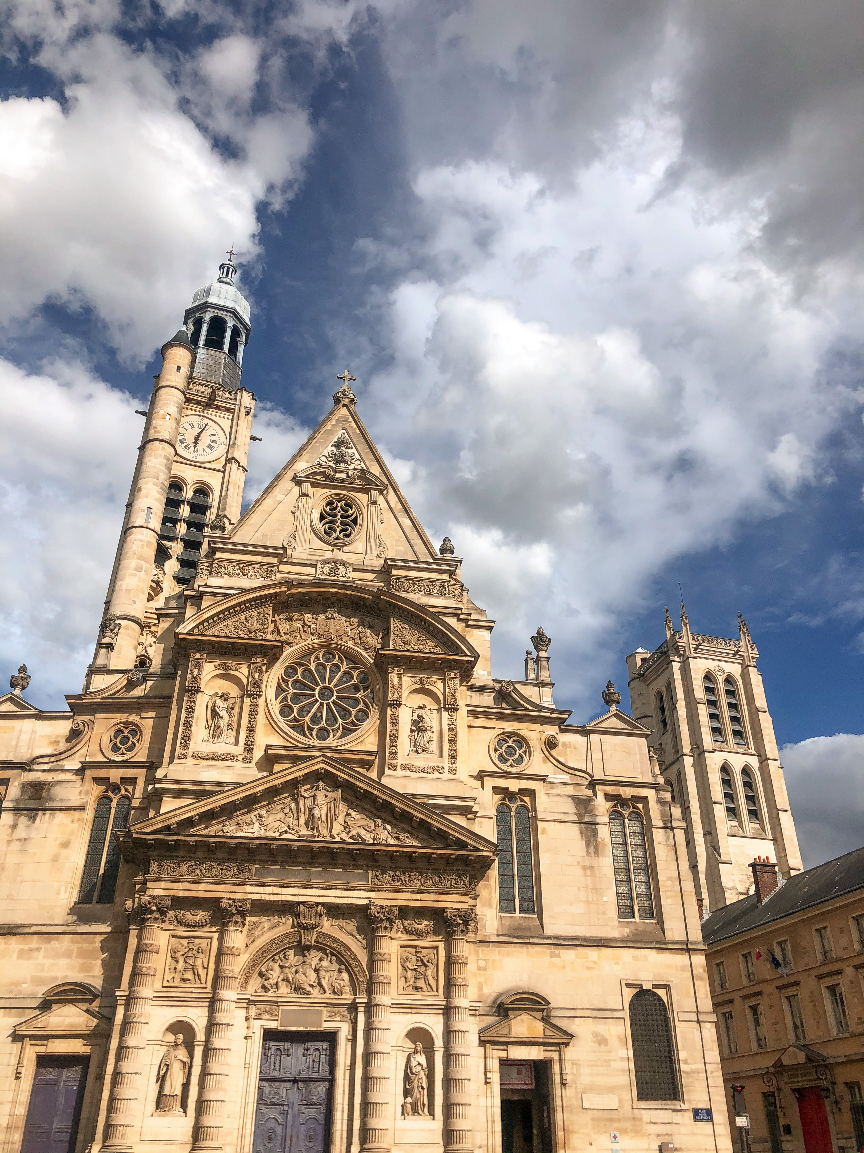 a large stone building with a clock tower