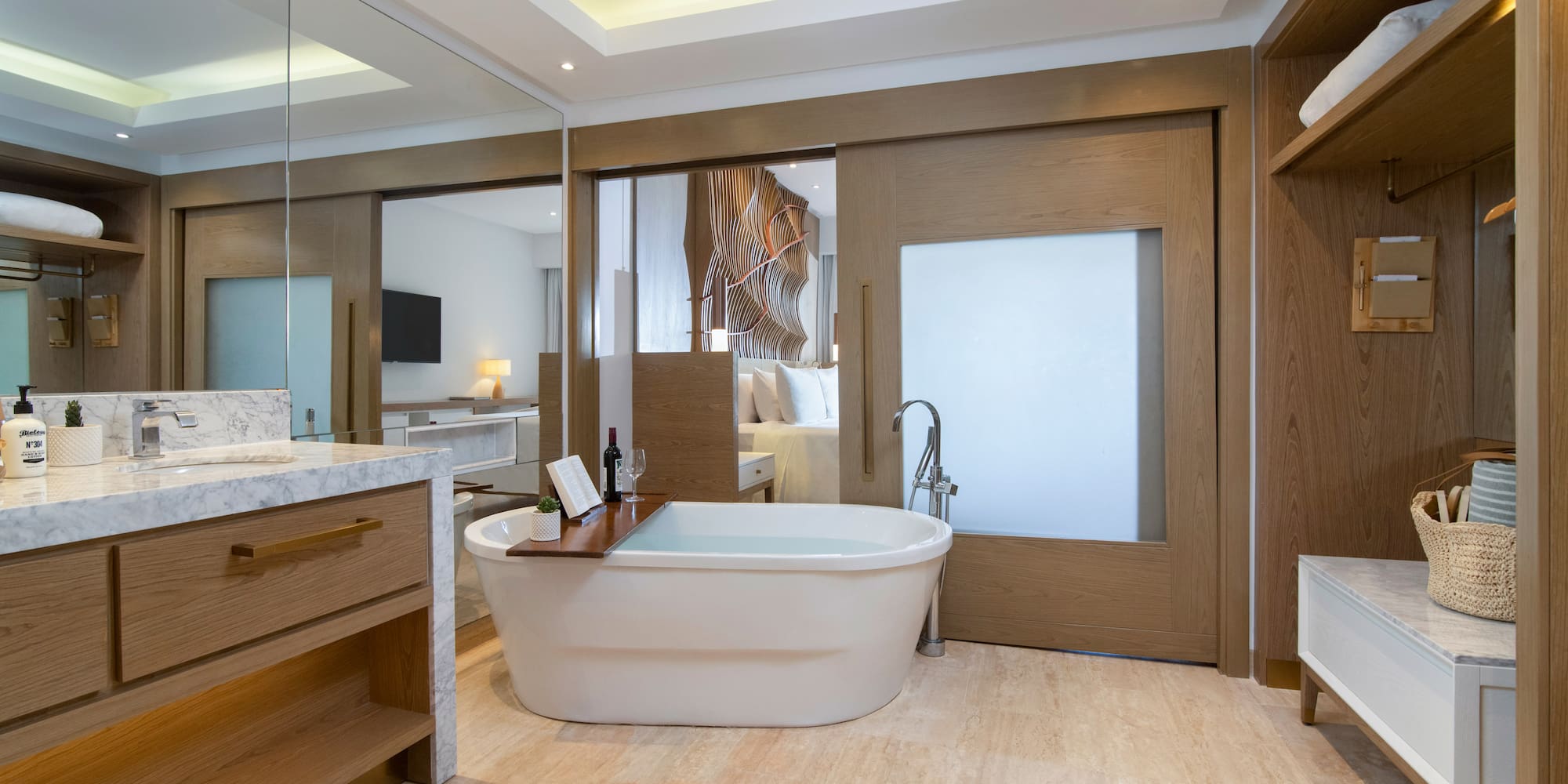 a bathroom with a tub and a sink