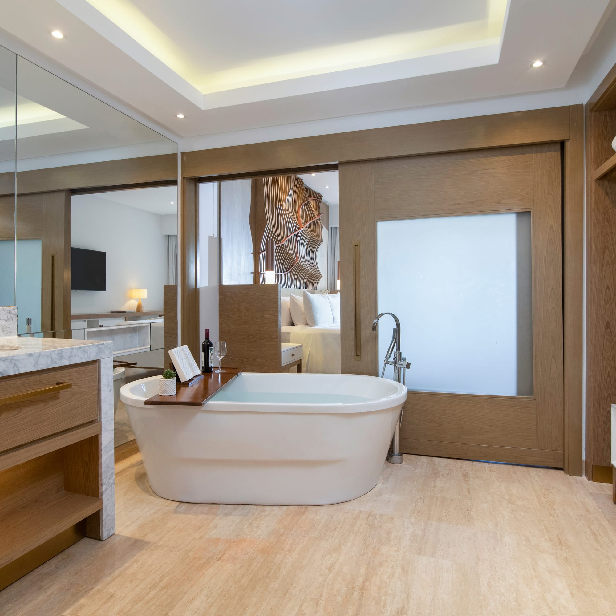 a bathroom with a tub and a sink