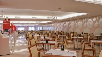 a room with tables and chairs