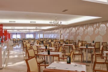 a room with tables and chairs