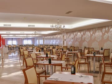 a room with tables and chairs