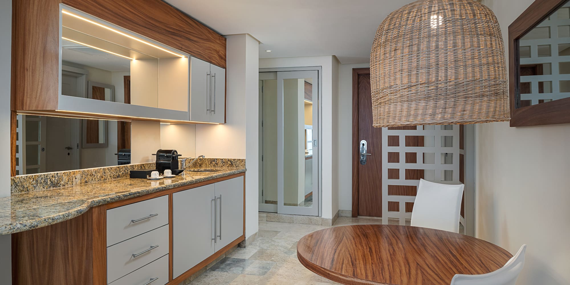 a room with a table and chairs