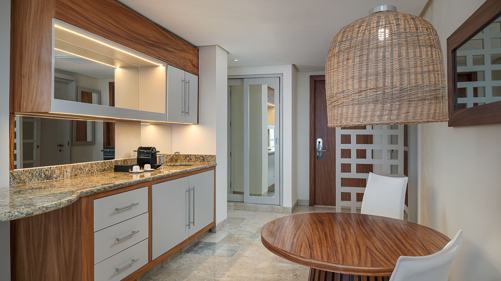 a room with a table and chairs