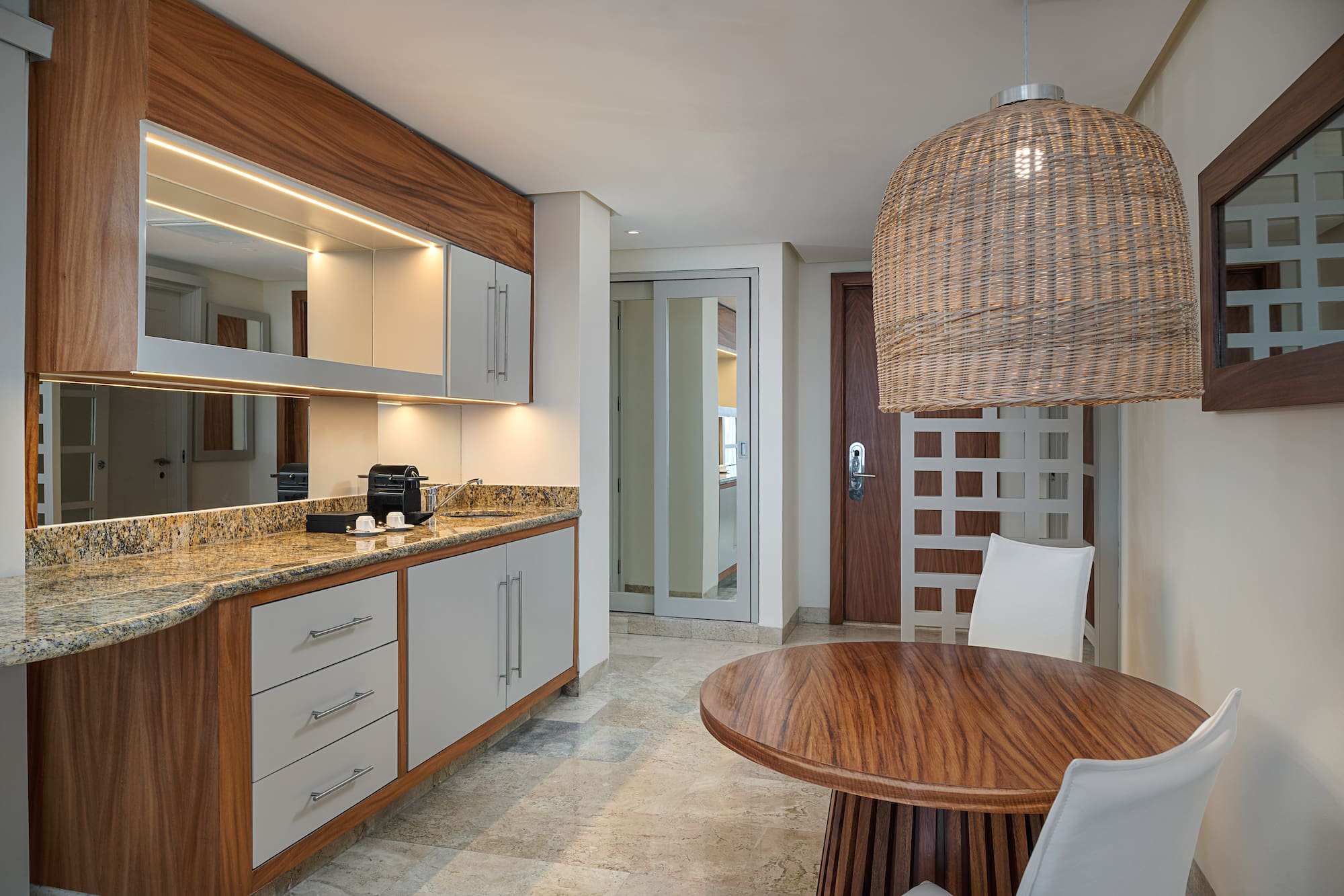 a room with a table and chairs