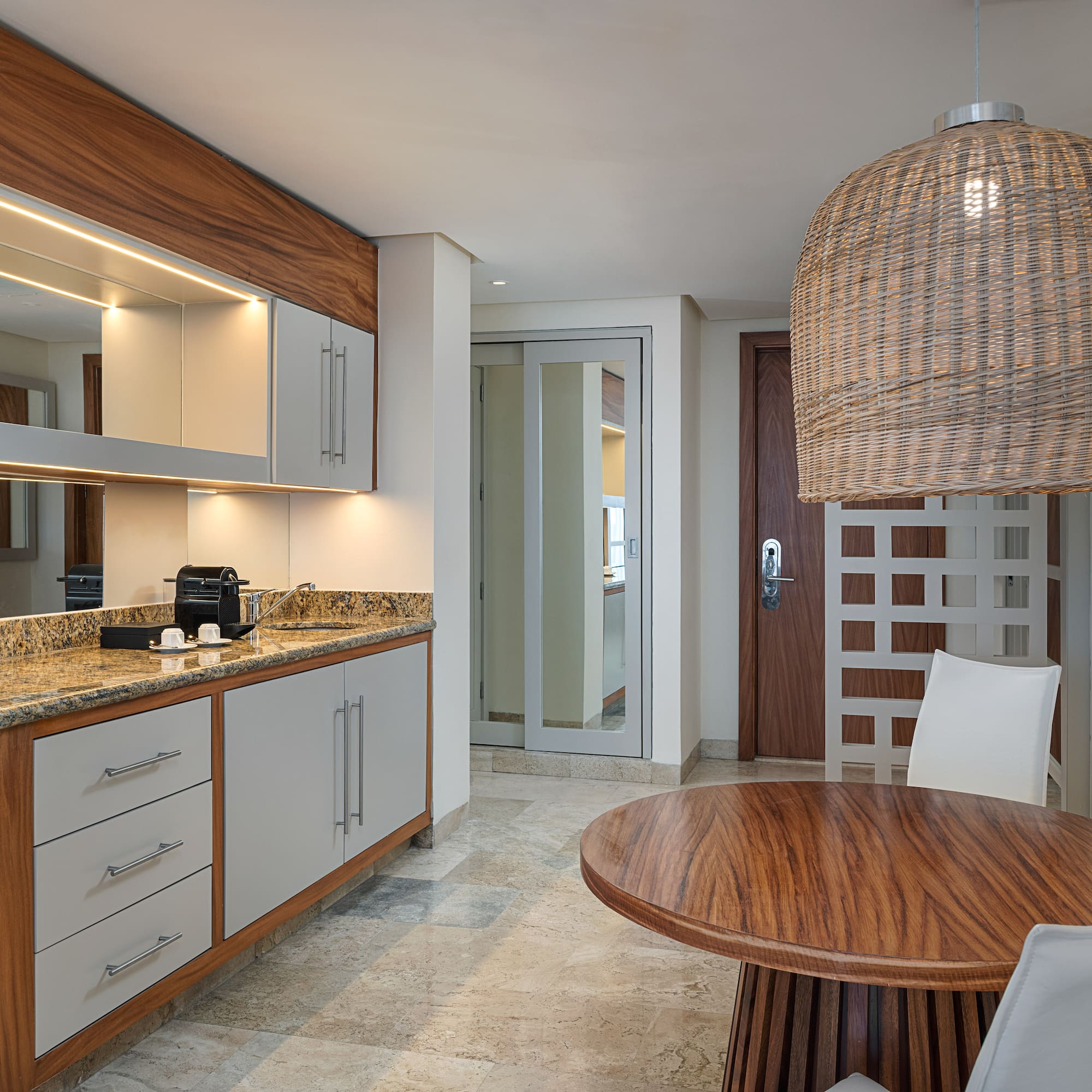 a room with a table and chairs