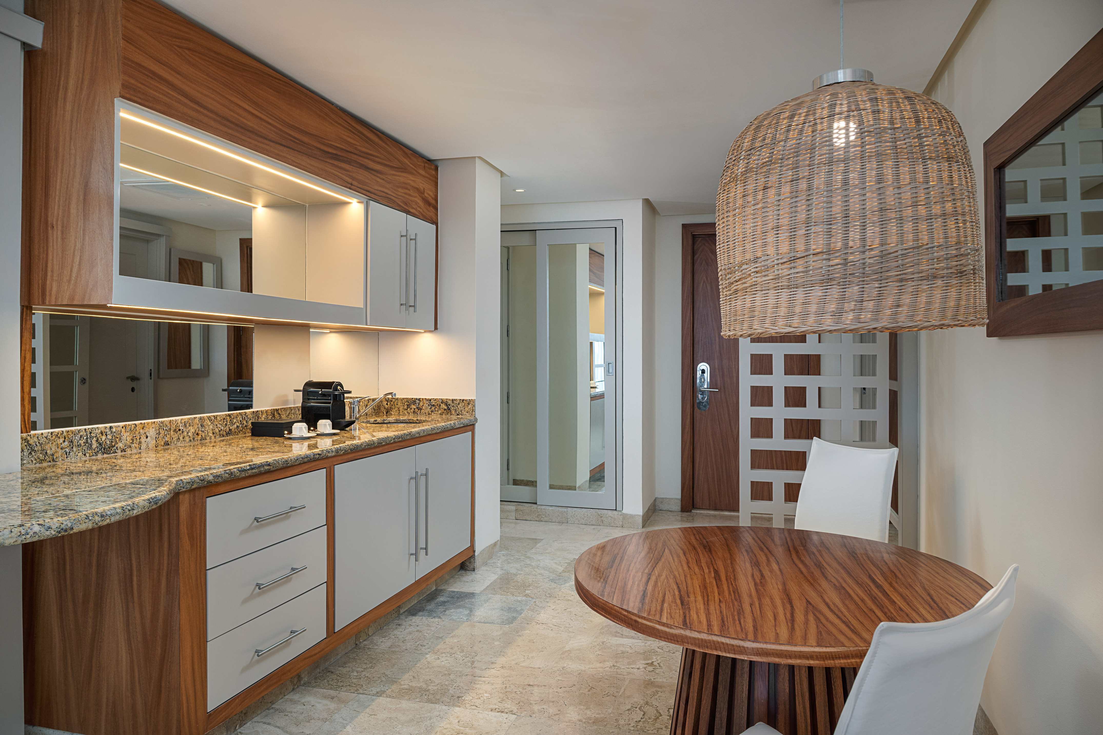 a room with a table and chairs