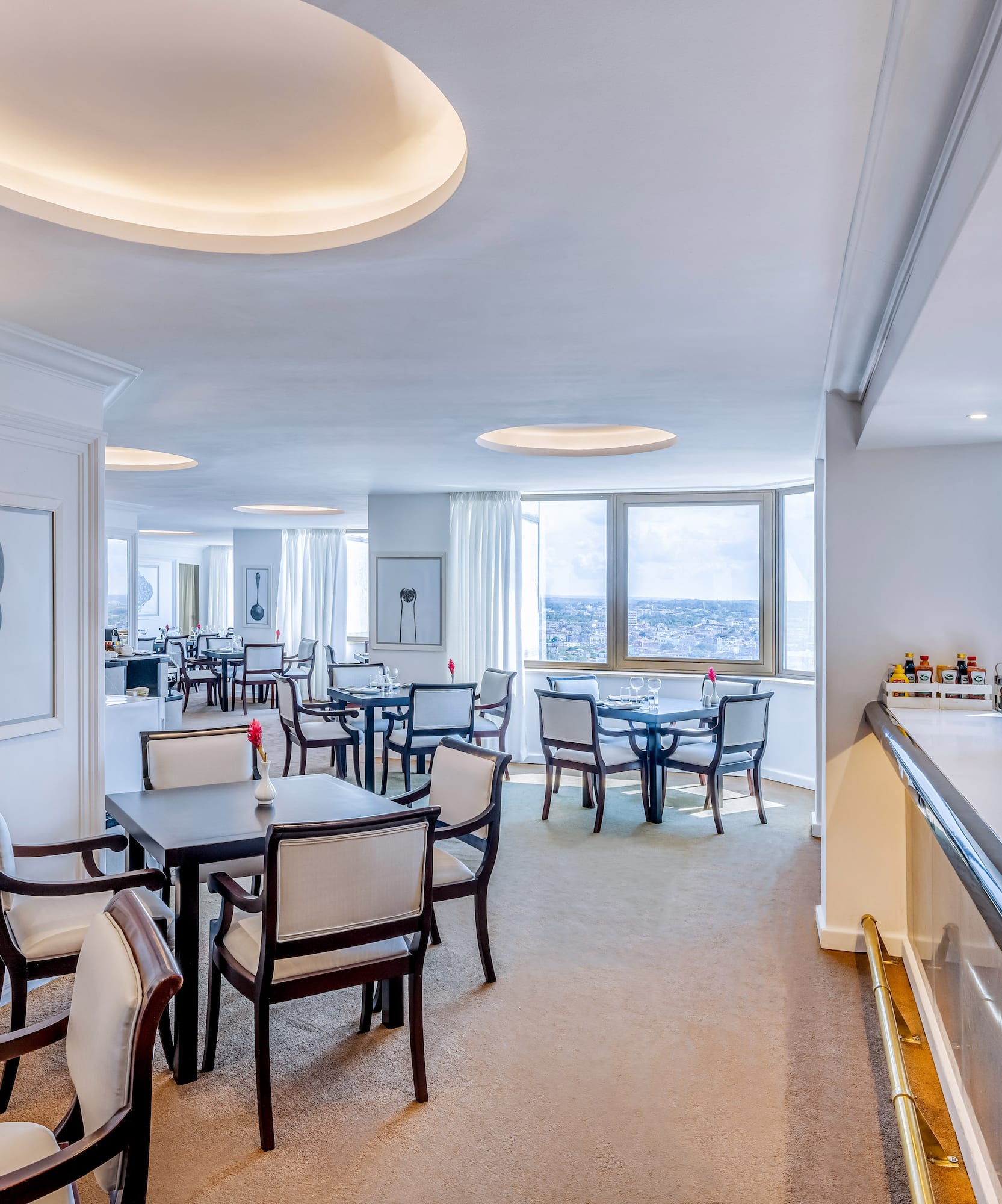 a room with tables and chairs