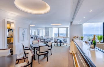 a room with tables and chairs