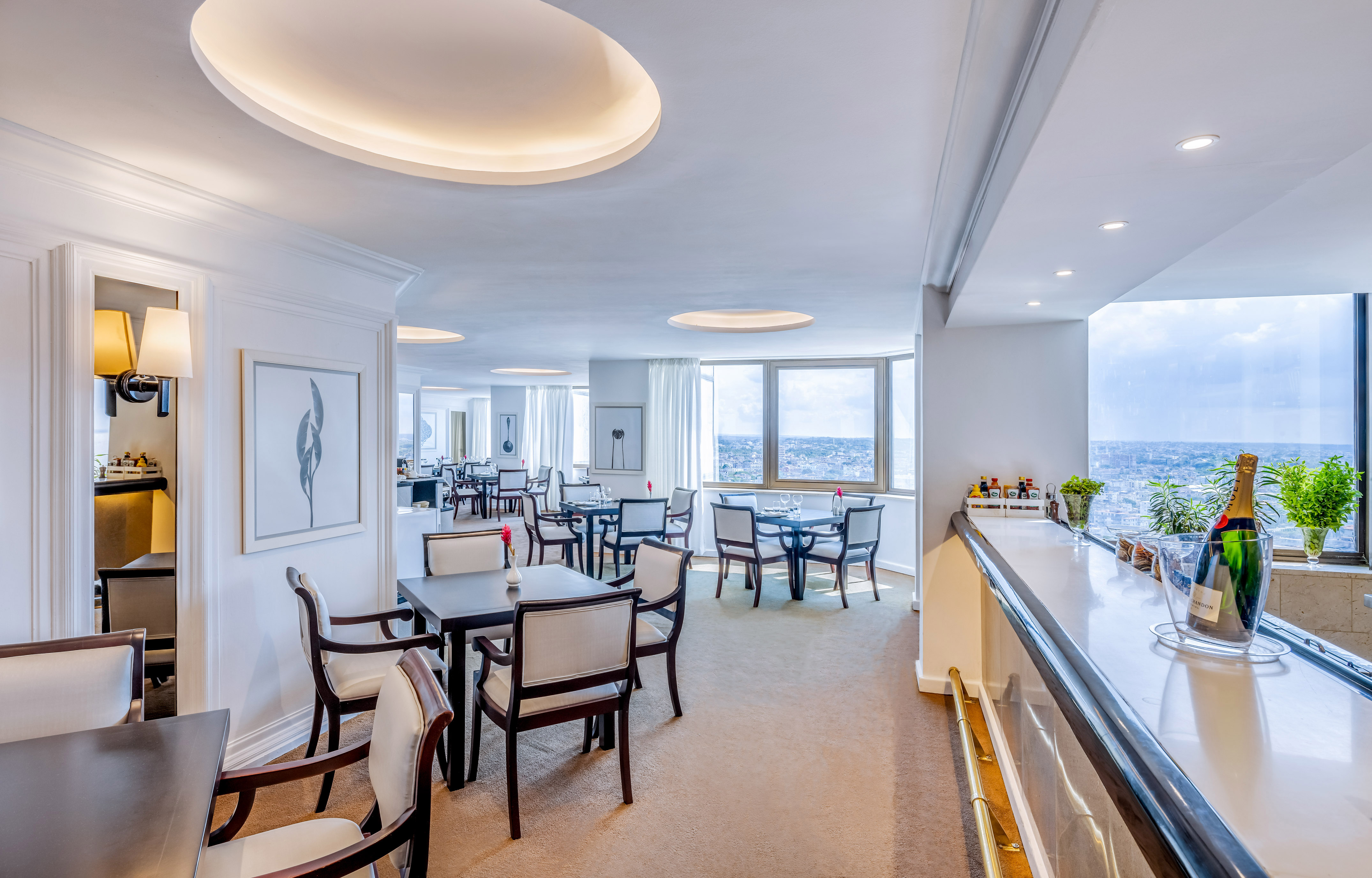 a room with tables and chairs