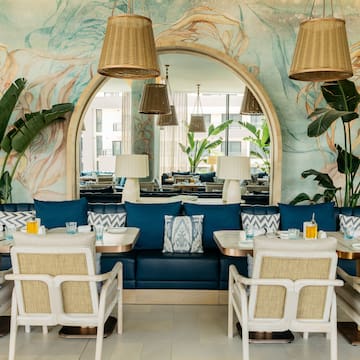 a room with tables and chairs