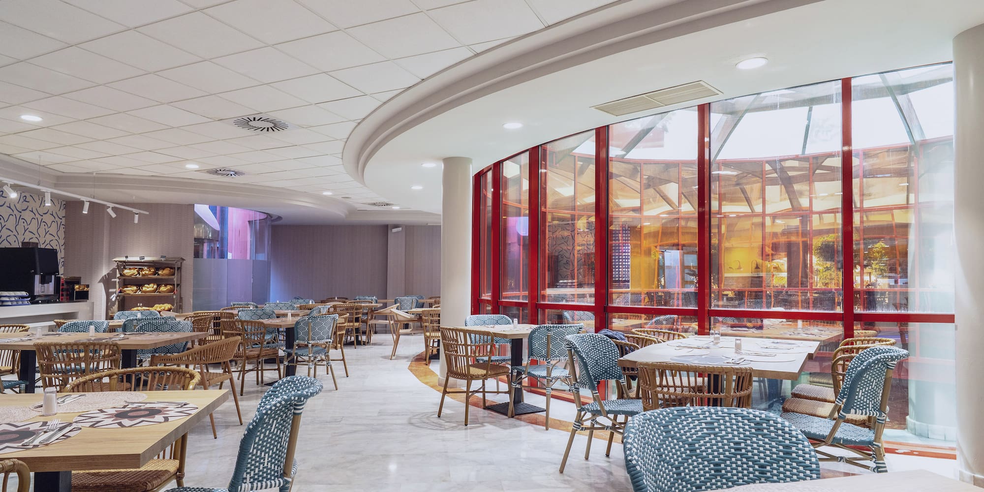 a room with tables and chairs