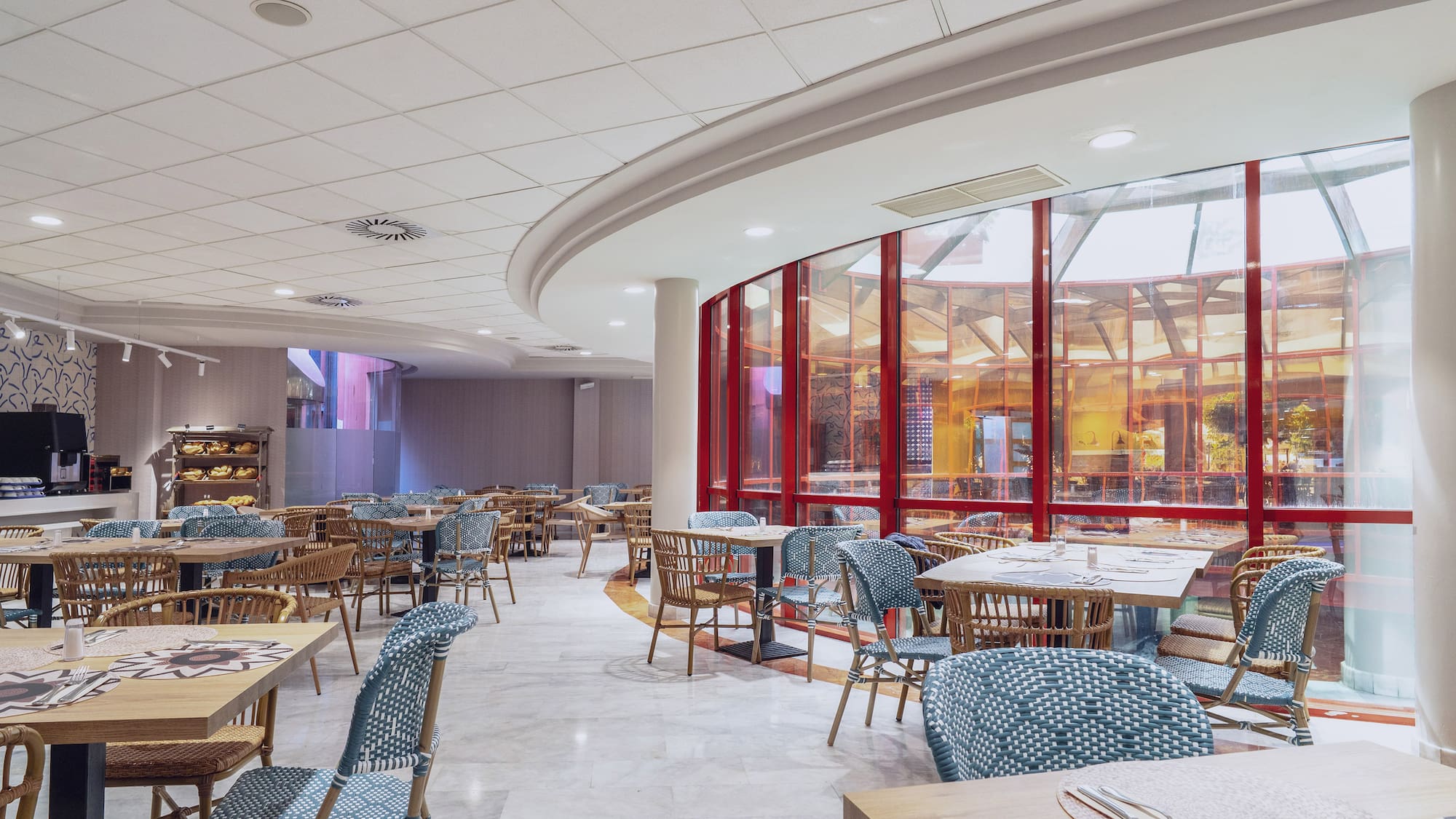 a room with tables and chairs