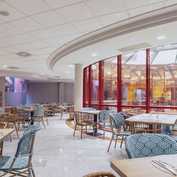 a room with tables and chairs