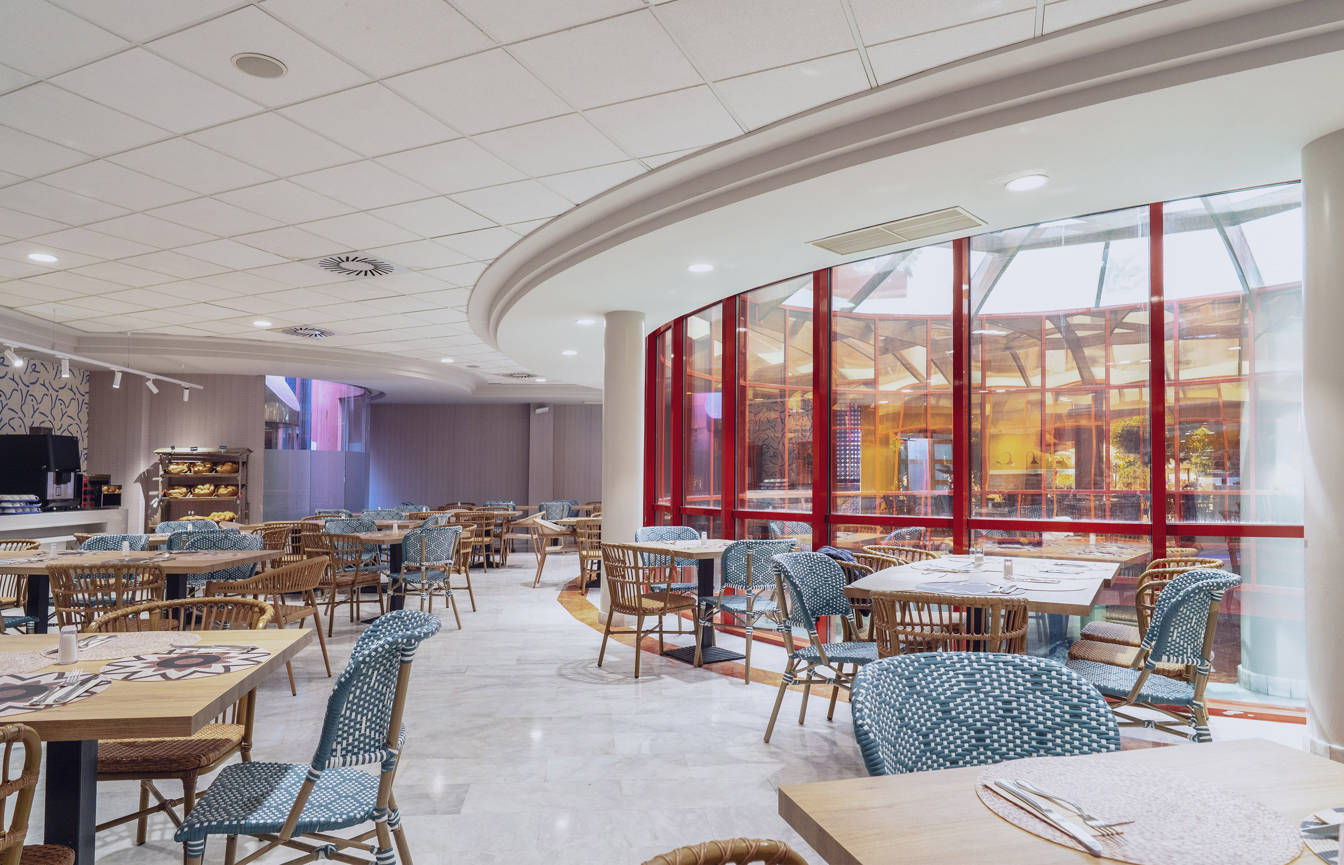 a room with tables and chairs