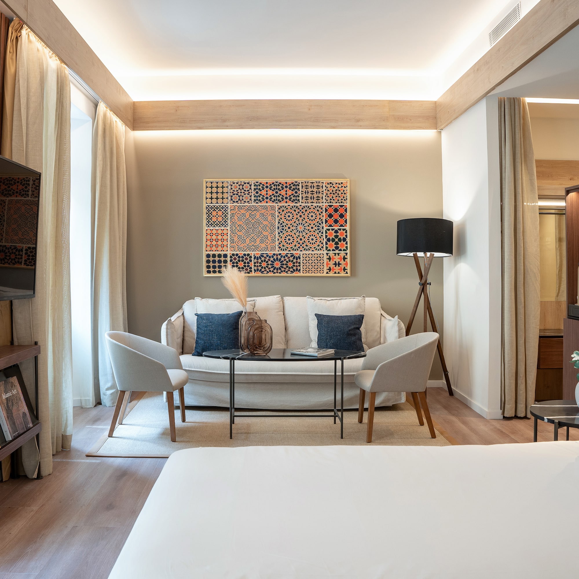 a room with a couch and tv