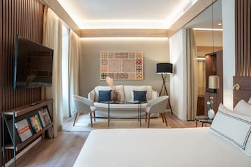 a room with a couch and tv