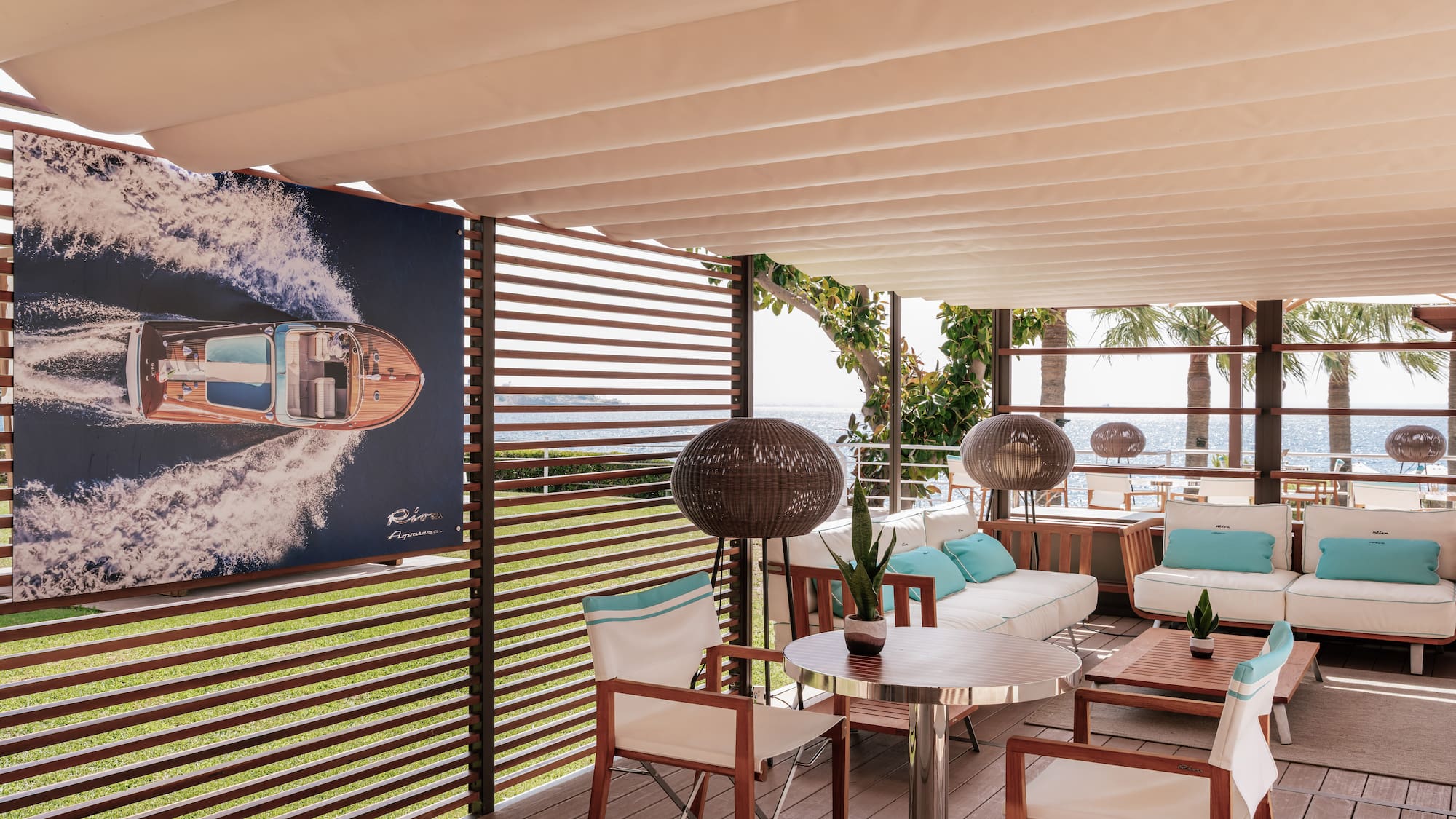 a patio with a poster on the wall