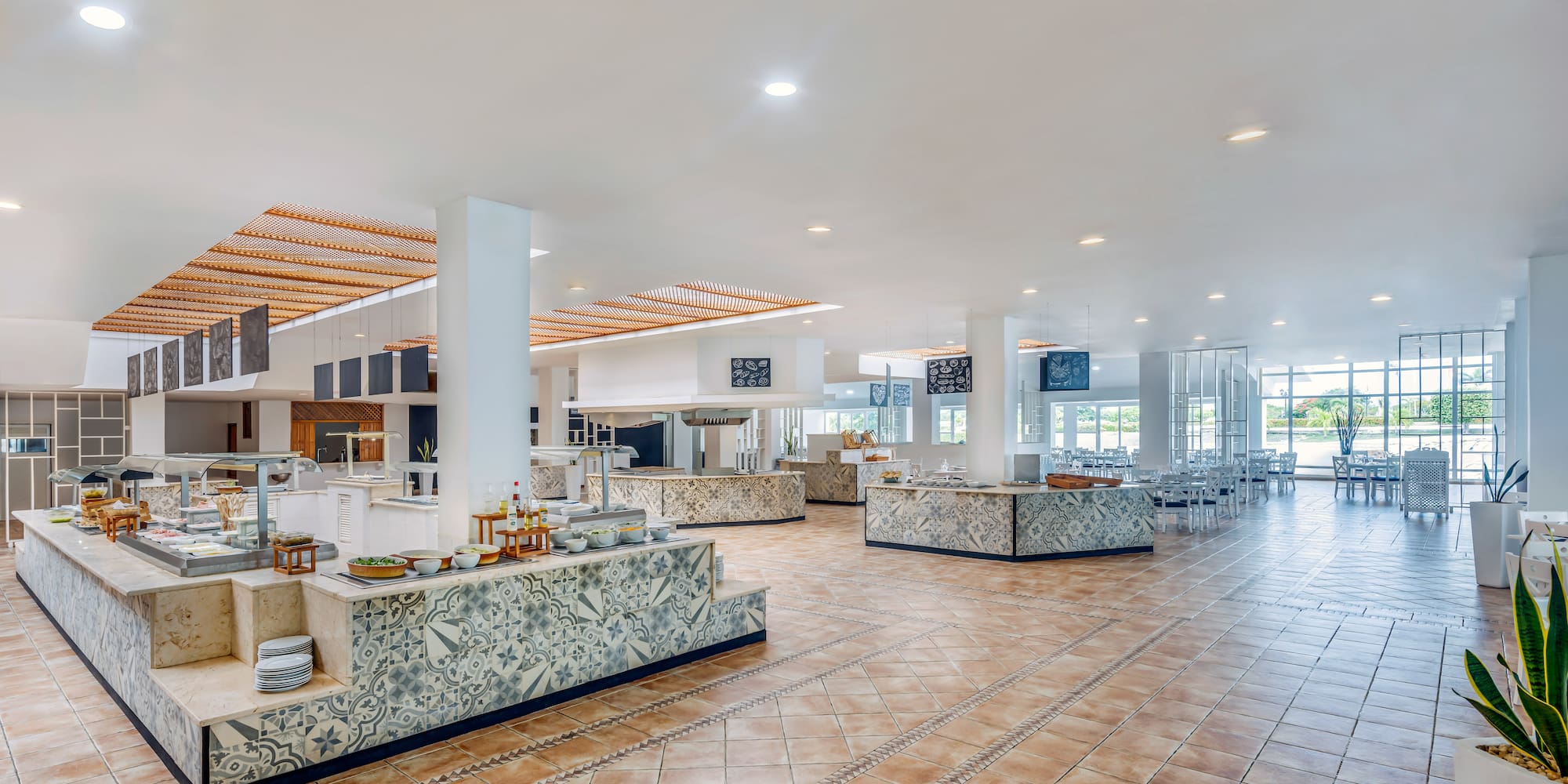 a large room with a large counter and a large ceiling