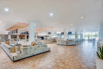 a large room with a large counter and a large ceiling