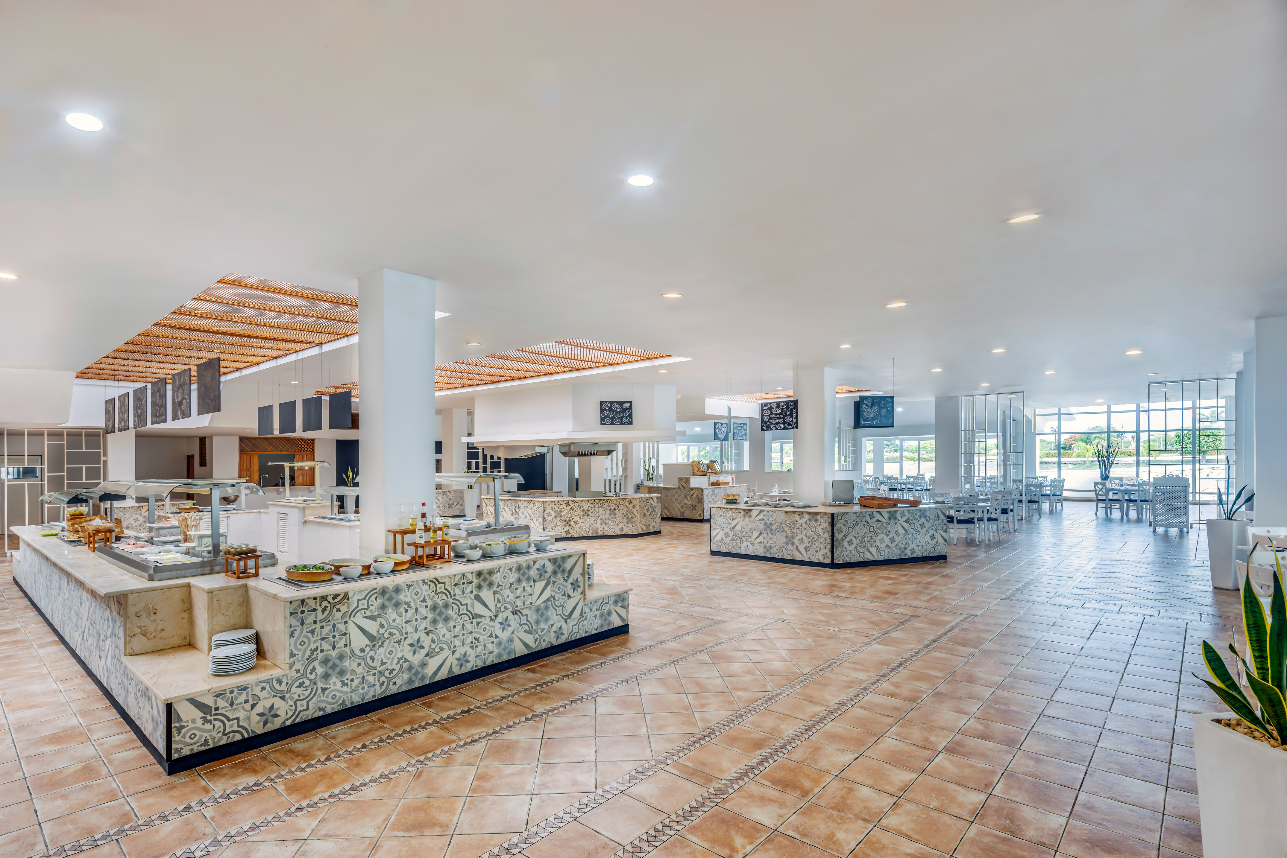 a large room with a large counter and a large ceiling