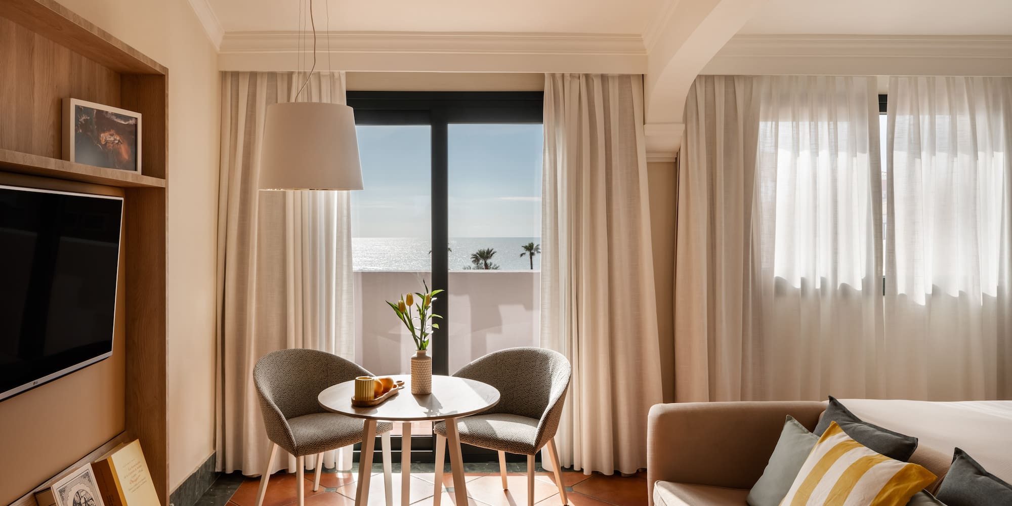 a room with a table and chairs