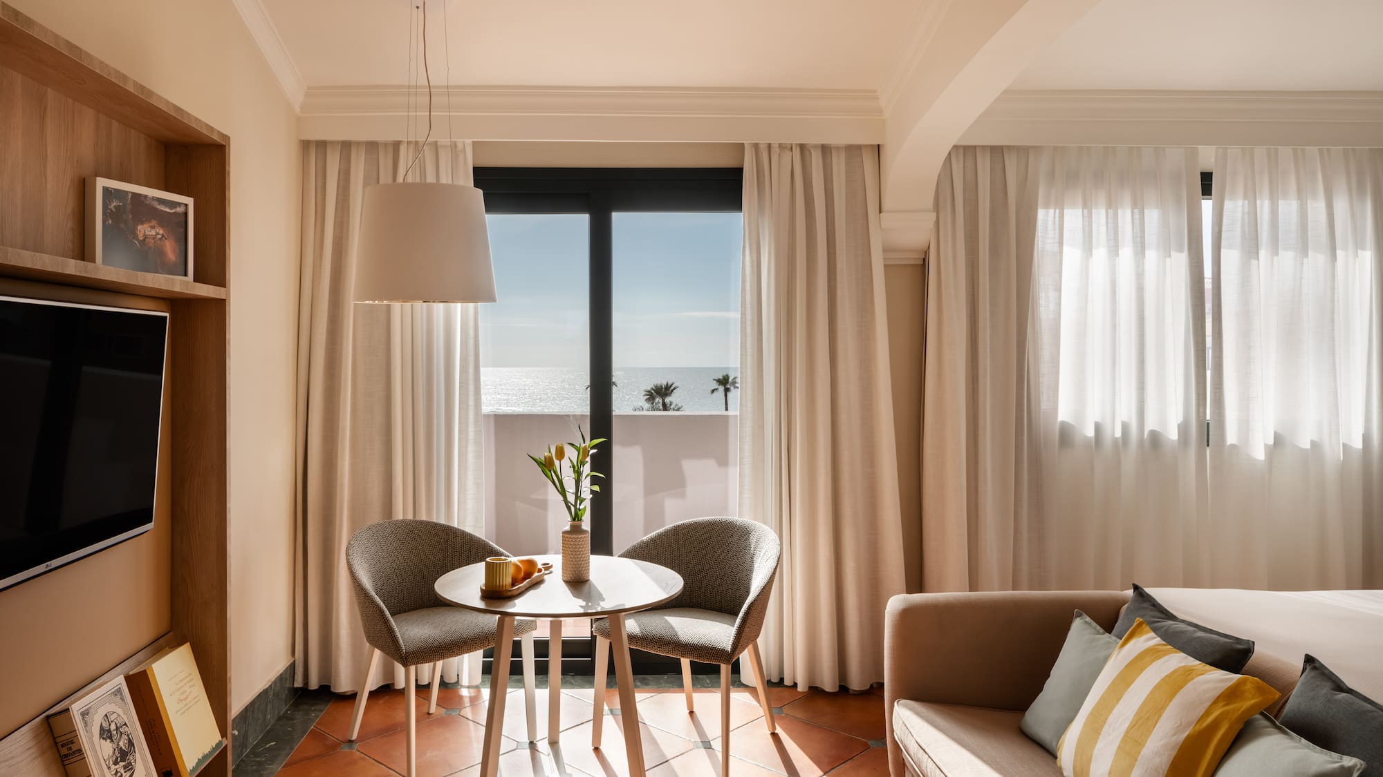 a room with a table and chairs