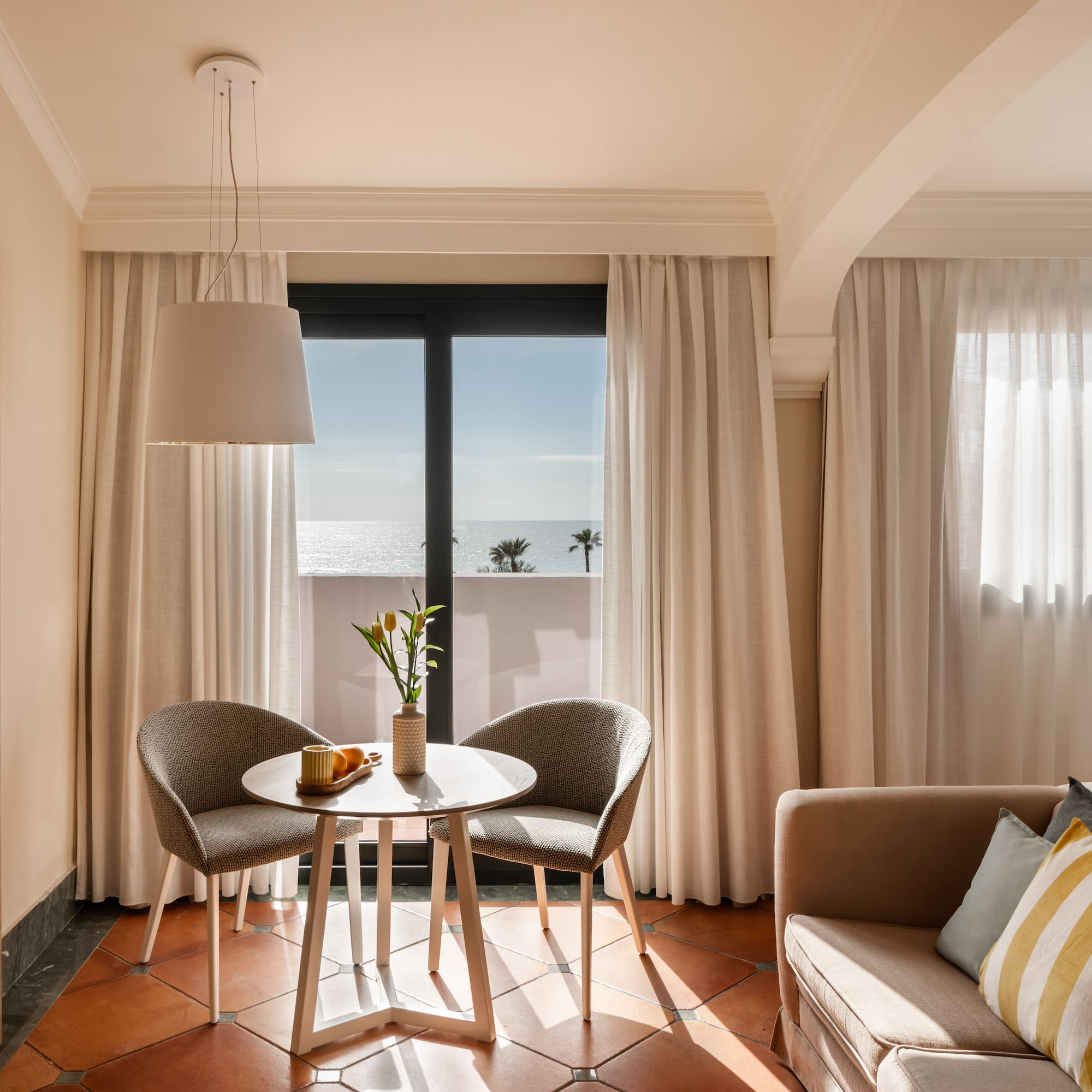 a room with a table and chairs