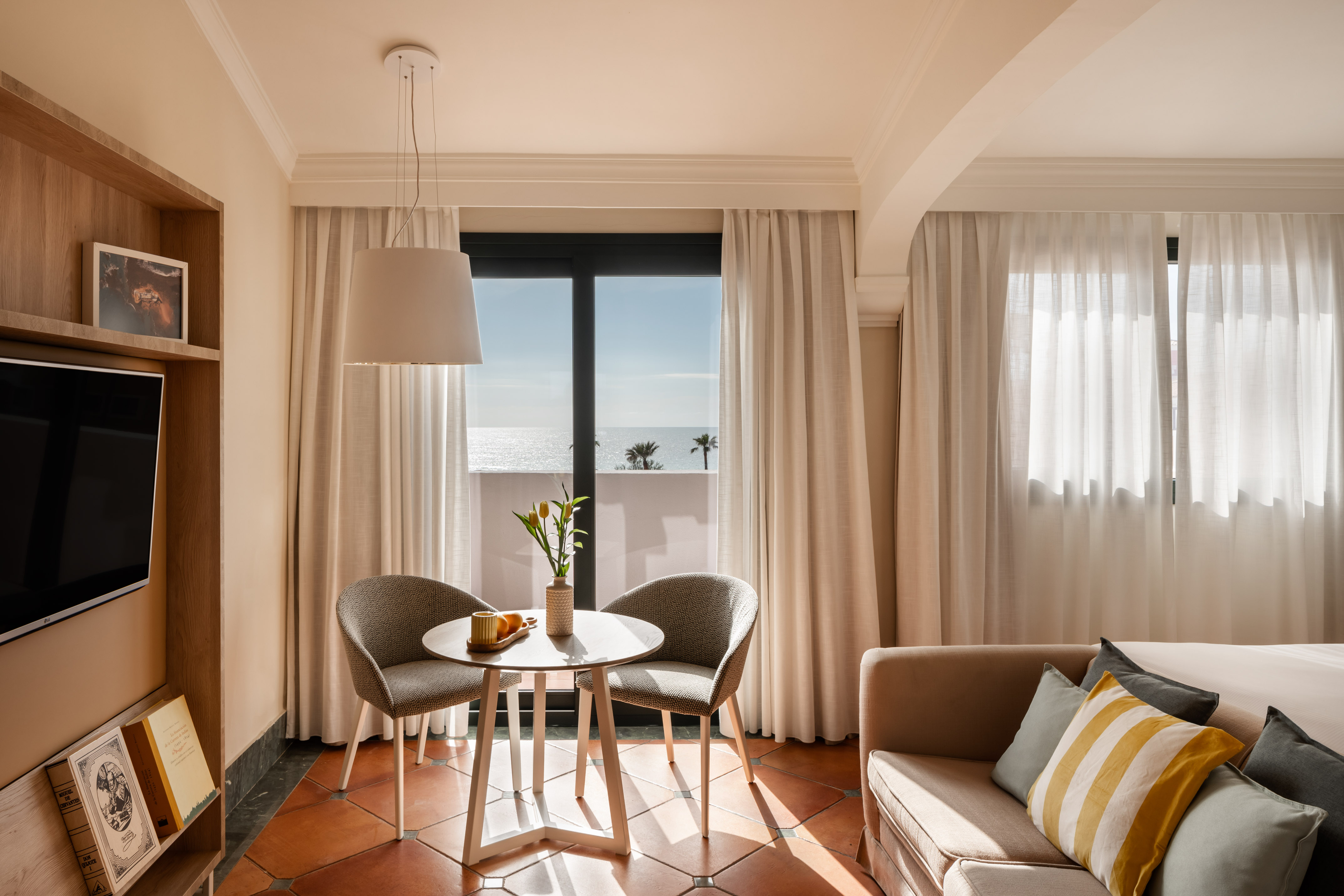 a room with a table and chairs