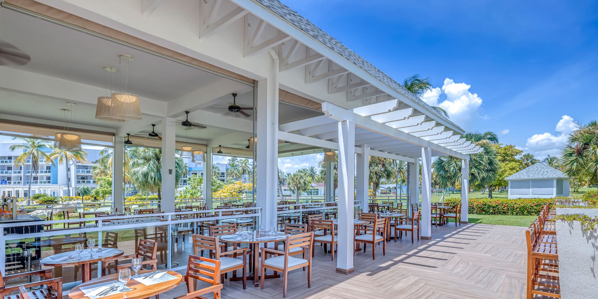 a restaurant with tables and chairs