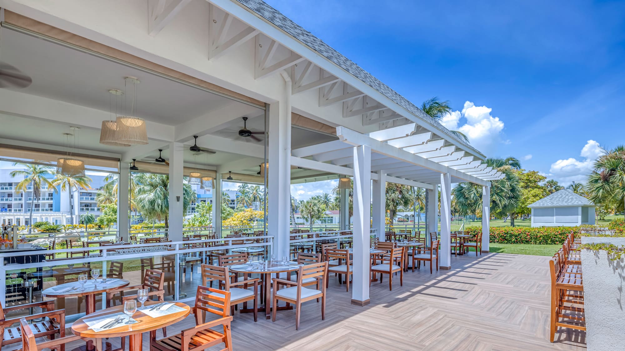 a restaurant with tables and chairs