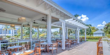a restaurant with tables and chairs