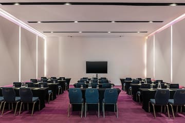 a room with tables and chairs