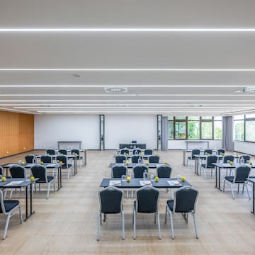 a room with tables and chairs