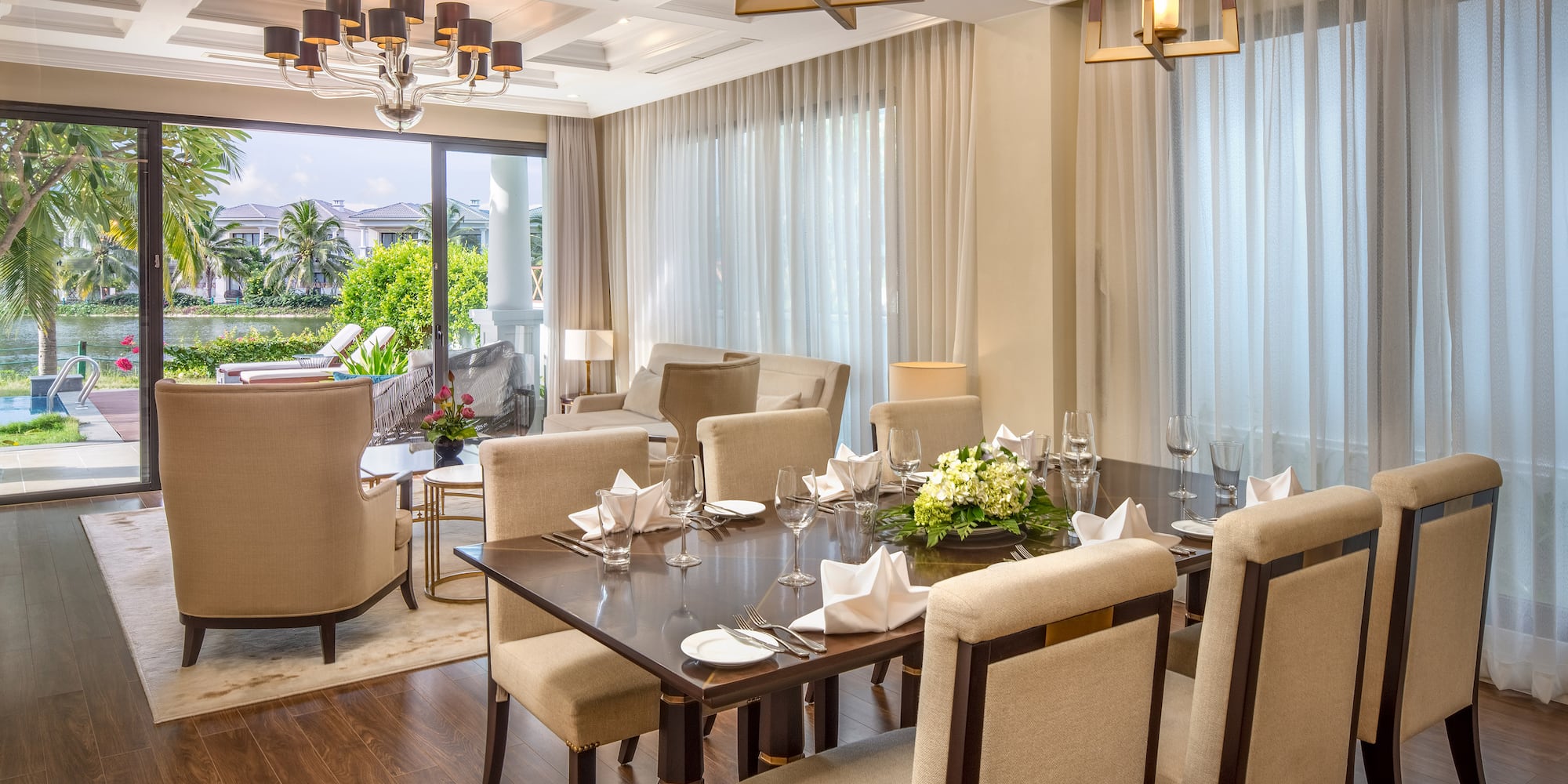 a dining room with a table and chairs