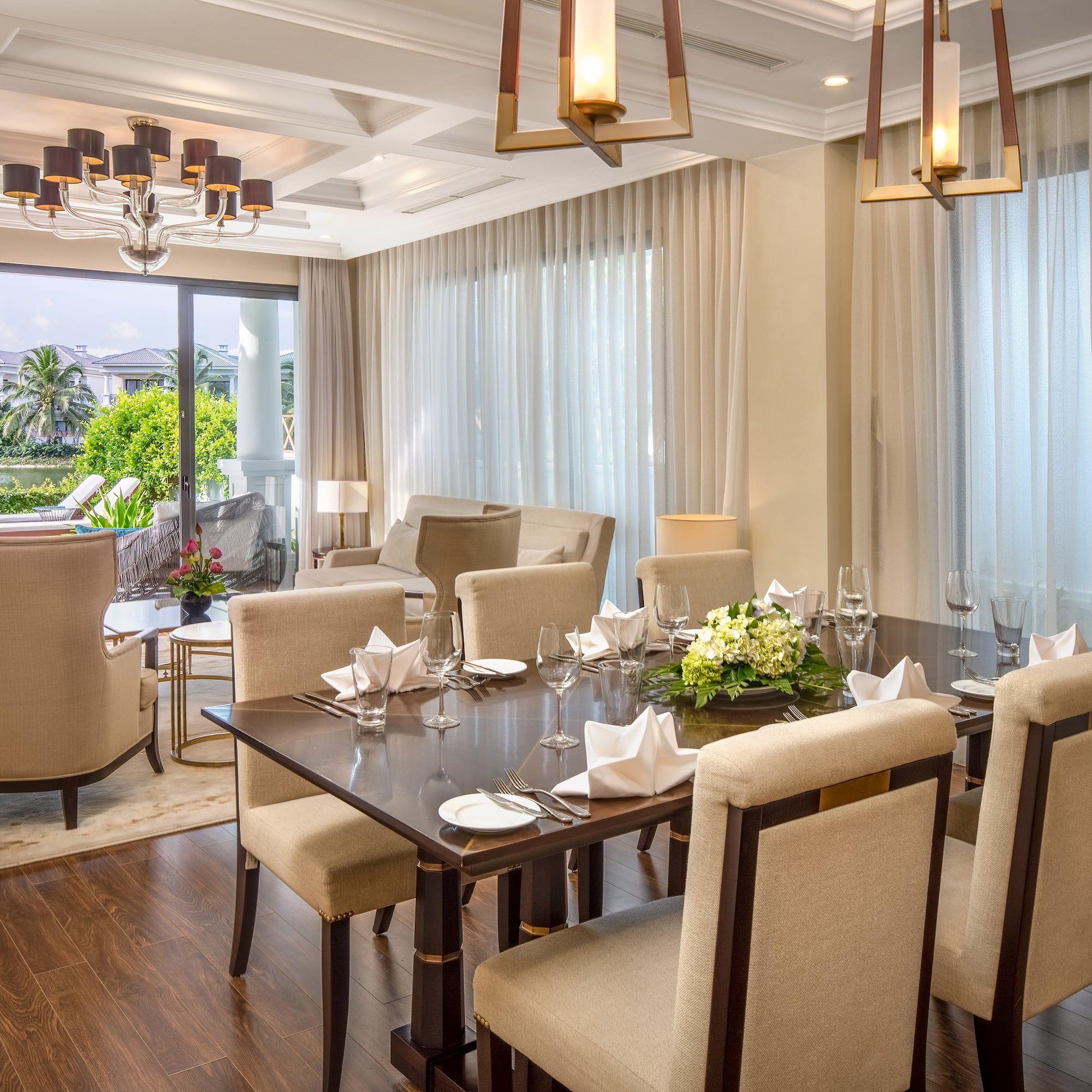 a dining room with a table and chairs