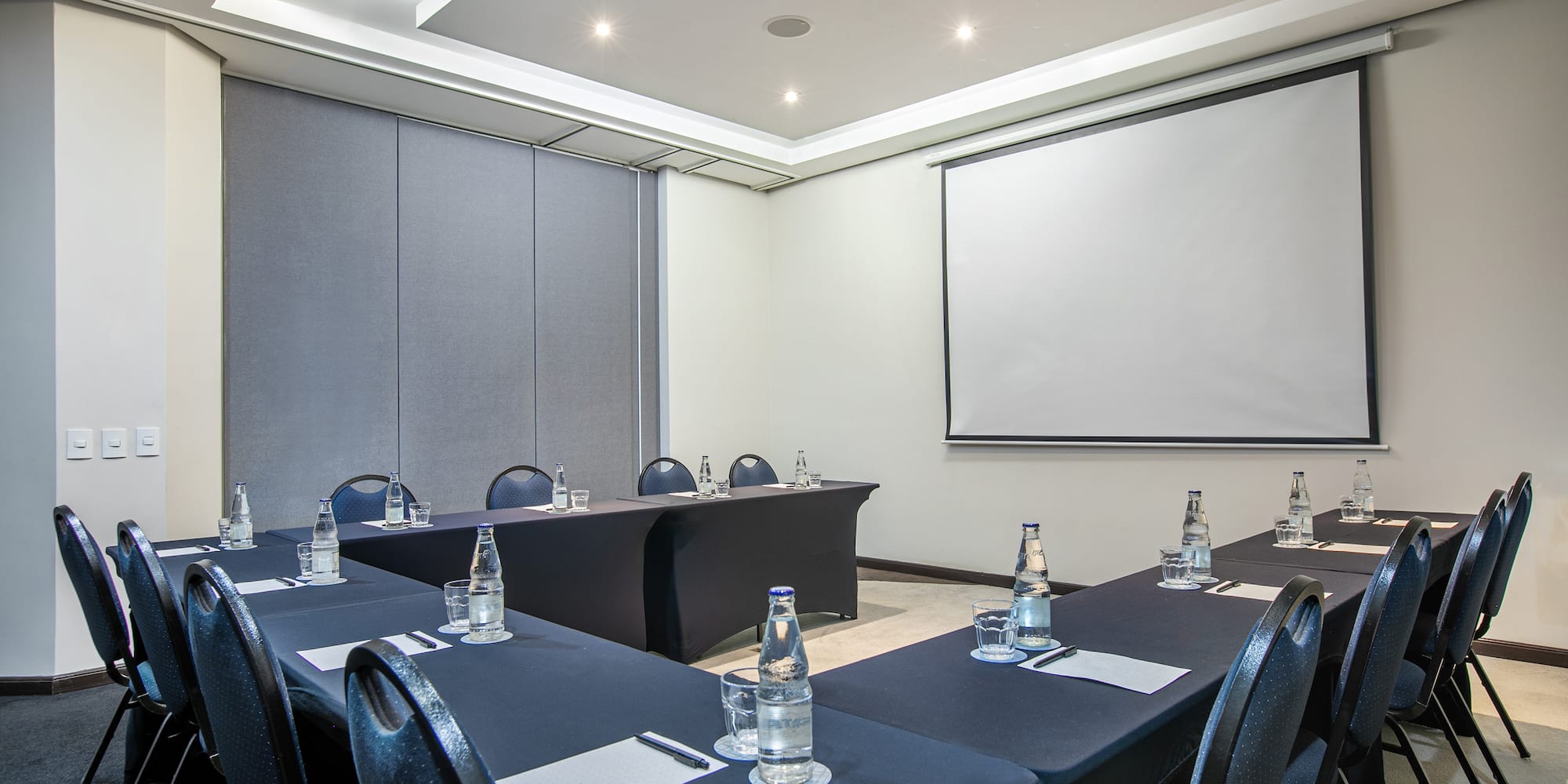 a room with tables and chairs