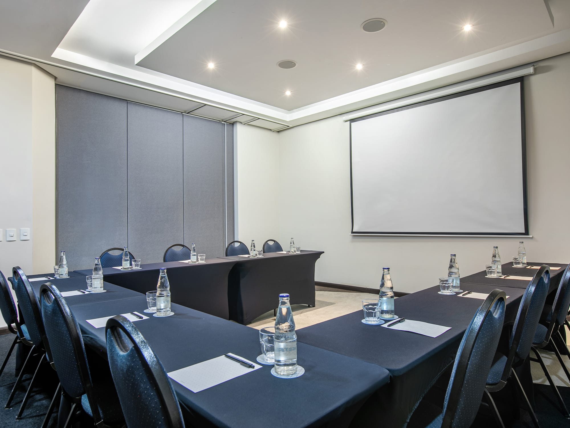 a room with tables and chairs