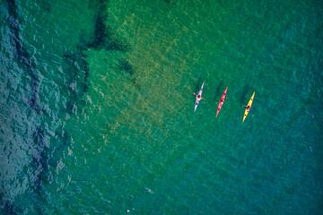 a group of kayaks in the water