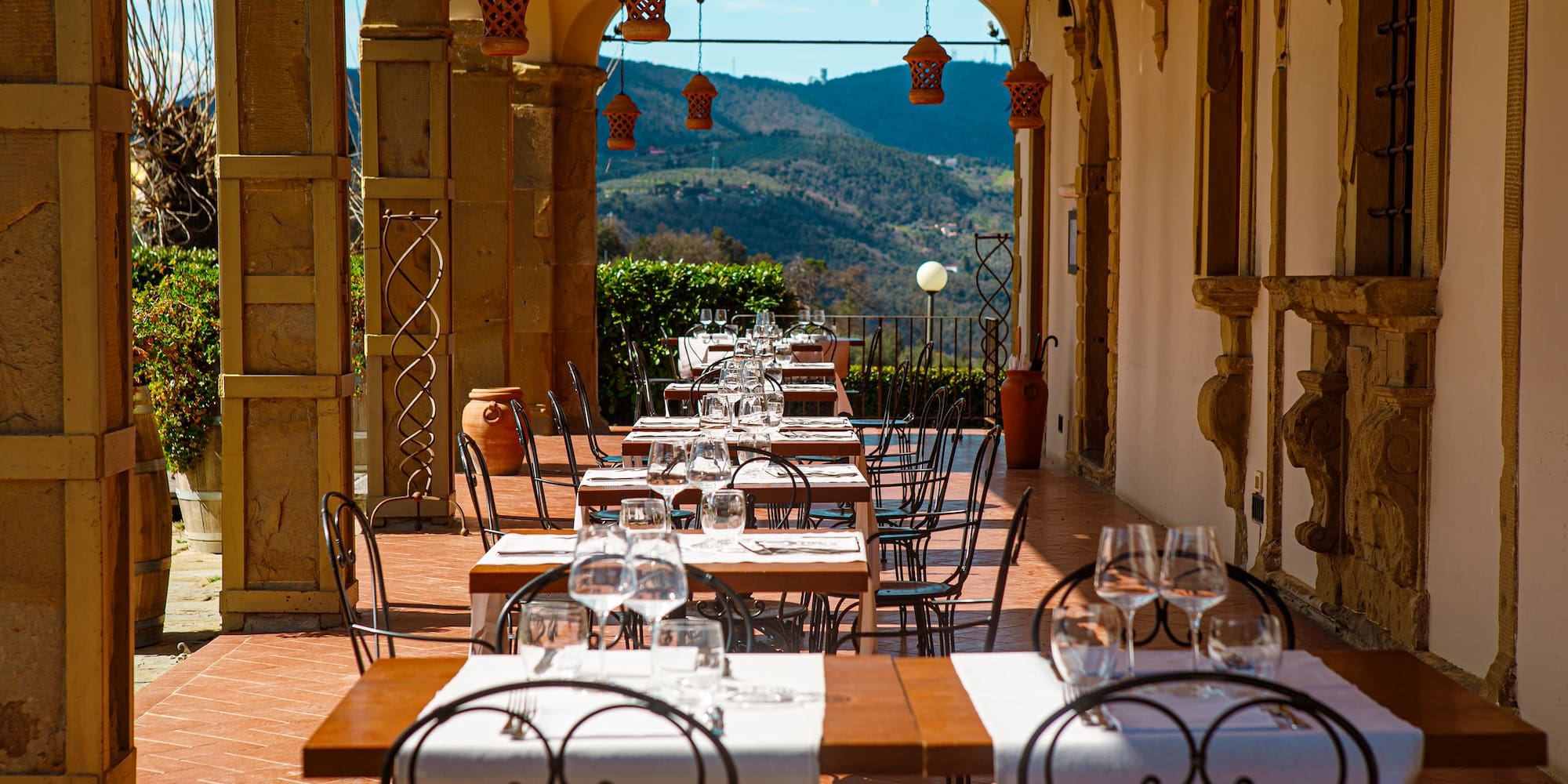 a restaurant with tables and chairs